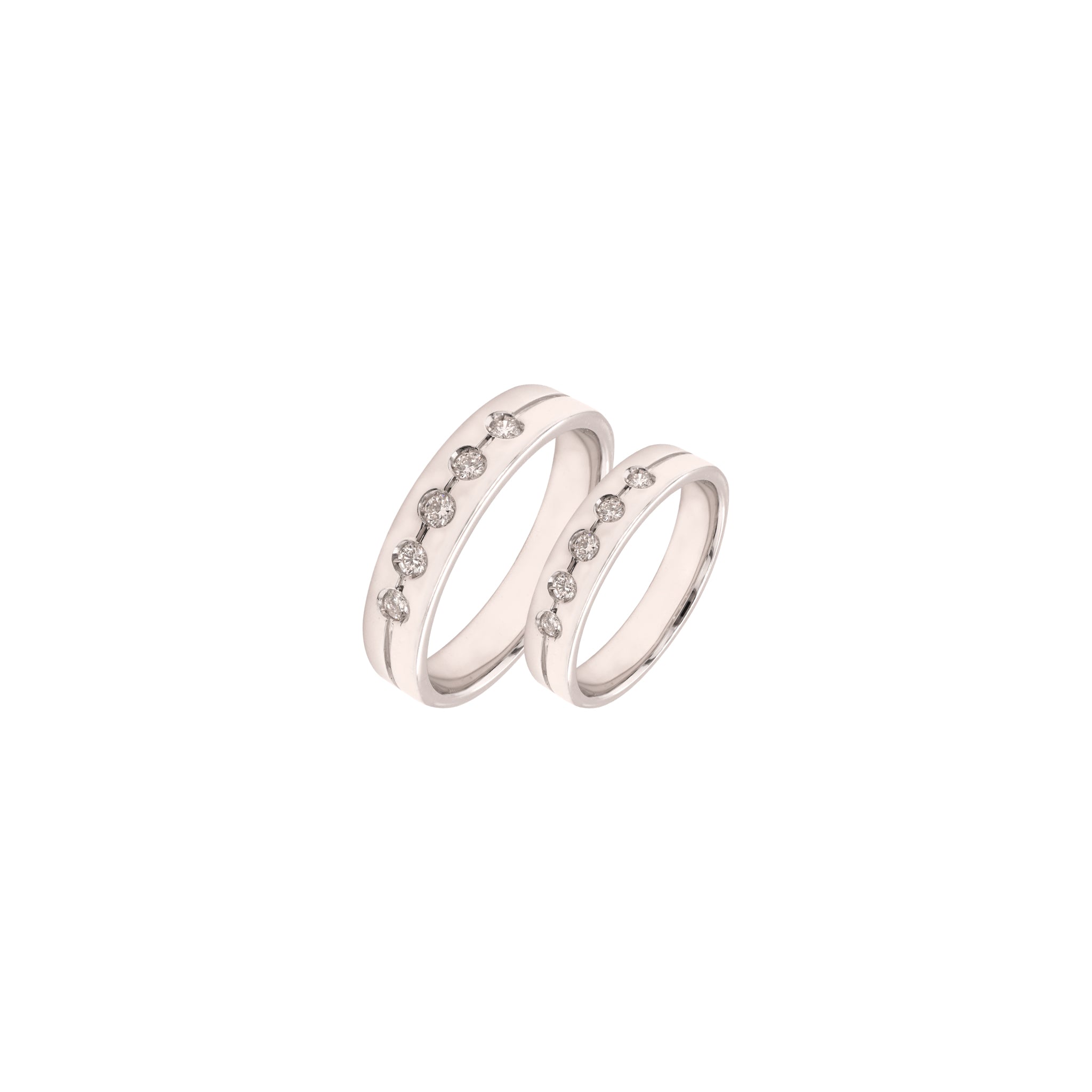 Pair of white gold, wedding bands with 5 diamonds each