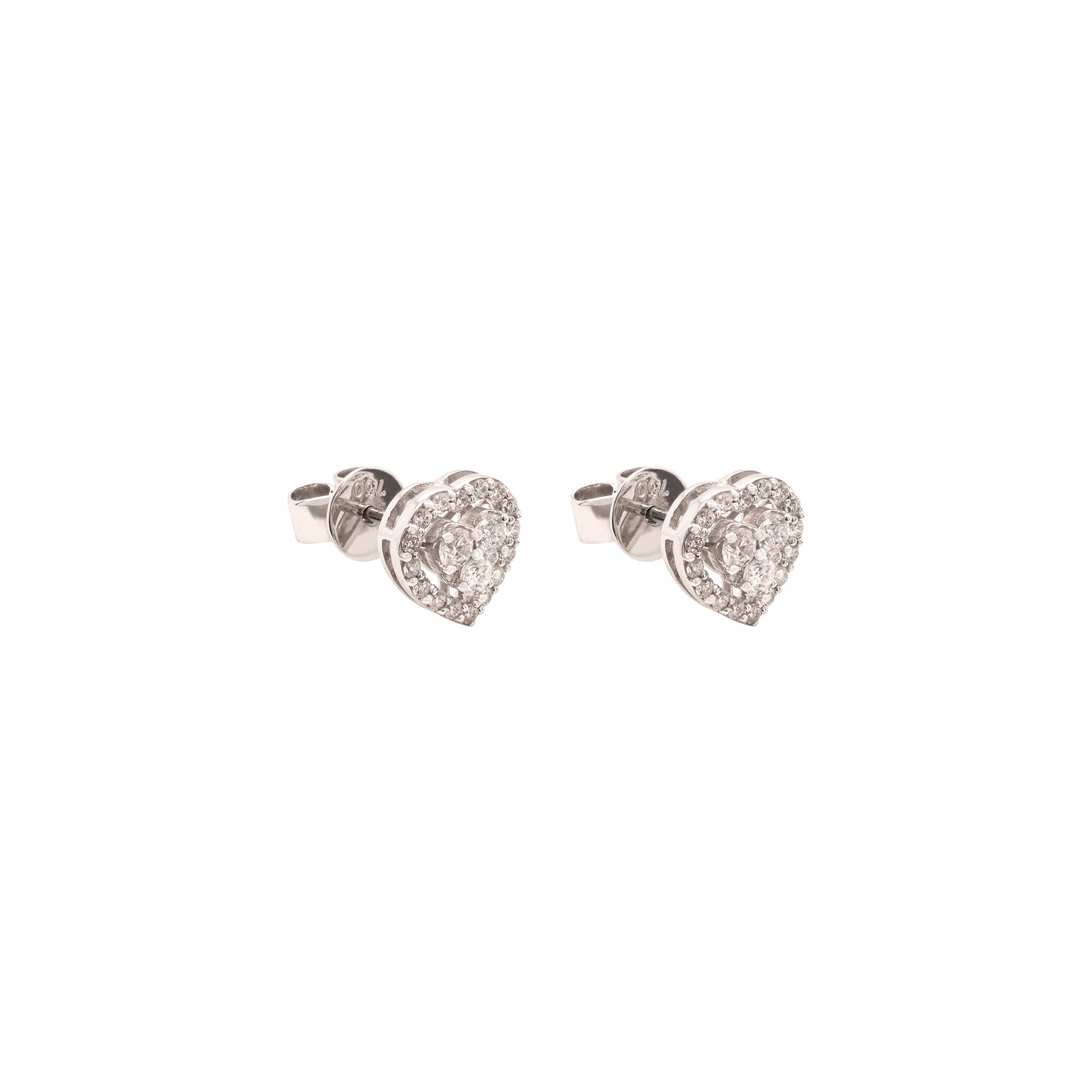 Heart-shaped earrings with sparkling diamond on a white background